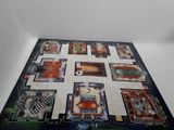 the board game has a lot of cards on it and is ready to be played