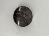 an image of a black and white object on a white surface