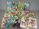 a bunch of comics sitting on top of a table next to each other