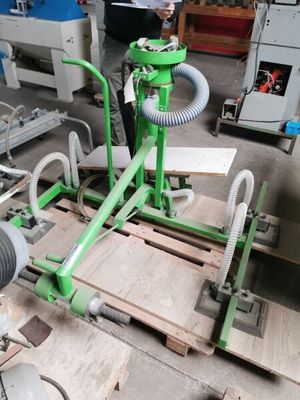 a machine that is sitting on a pallet in a room