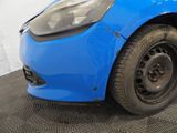 a close up of a blue car on the floor