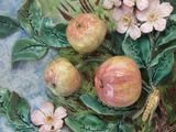 a painting of apples and flowers on a plate