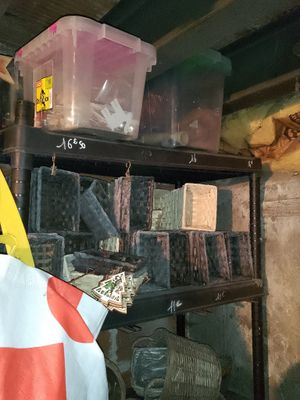 a large bag hanging from a shelf in a room