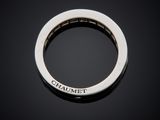 a close up of a ring with the word charmet engraved on it
