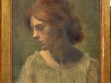 une peinture à l'huile représentant une femme en robe verte aux cheveux roux