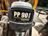 an image of a powerplainer in a garage
