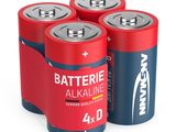 three batteries are stacked on top of each other on a white surface