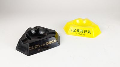 a pair of black and yellow legos sitting next to each other