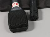 two microphones sitting next to each other on a table