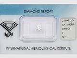un diamant dans une carte sur laquelle figure un diamant blanc