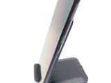 a cell phone that is sitting on a stand