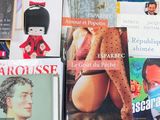 many books that are on the table together
