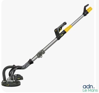 a yellow and black corded string trimmer on a white background