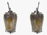 pair of antique silverplated sugar and pepper shakers with handles