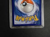 an image of a pokemon card in a plastic holder