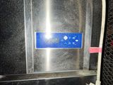 a black box with a blue button on it