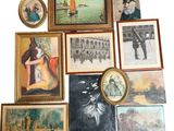 a lot of framed pictures on the wall of this room