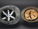 two bowls of food that are sitting on a table