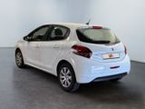a white car that is parked in a room