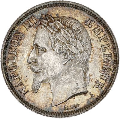 a close up of a coin with a man ' s face on it