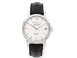 a close up of a watch on a white background