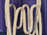 a rope that has been tied up to a pole