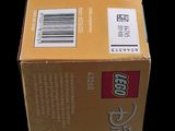 a box of legos sitting on a black surface