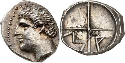 a silver coin with an image of a man on it