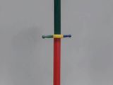 an image of a multicolored coat rack with pencils on it
