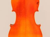 an orange violin with a bow on a white background