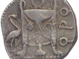 une pièce d'argent portant l'image d'un homme