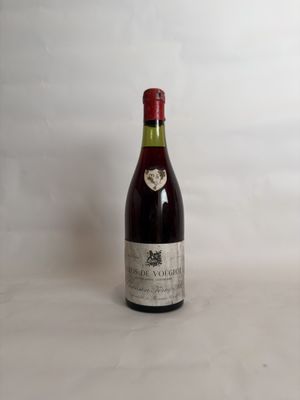 a bottle of wine that is sitting on a table