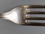 a fork that is sitting on top of a table