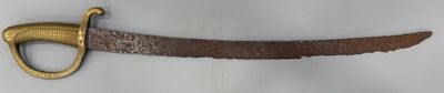 un gros plan d'une ceinture sur laquelle est accroché un couteau