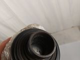 a person holding a water bottle in their hand