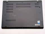 a black laptop that is sitting on a white table