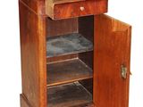 a small cabinet with a door open on a white background