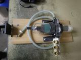 a machine that has a hose attached to it