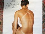 a poster with a picture of a naked woman on it