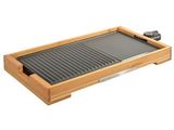 une image représentant une grille en bois surmontée d'une grille métallique