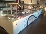 a buffet with many different types of food on it