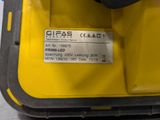 the back end of a yellow and black machine with a label on it