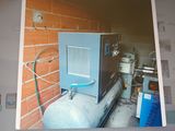 a picture of a picture of a room with a water heater on it