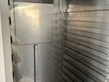 an image of a commercial kitchen with stainless steel cabinets