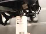 a person holding a luggage tag in their hand