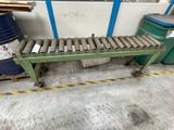 an image of a conveyor belt in a warehouse