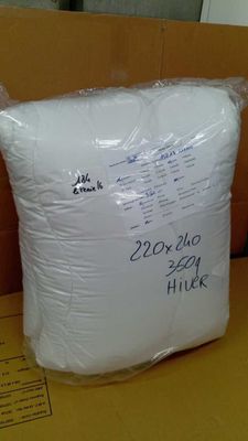 a pillow that has been wrapped in plastic on a box