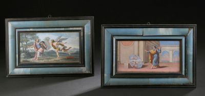 deux tableaux accrochés au mur d'une pièce sombre