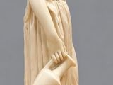 an image of a statue of a woman holding a bowl