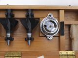 a wooden box that has a bunch of tools inside of it
